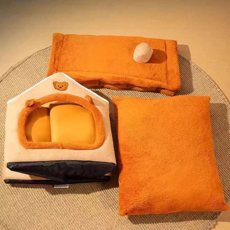 maison chat orange trois piĂšces de la maison