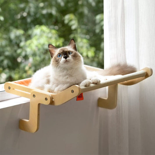 hamac pour chat rose gris sur fenêtre chat content