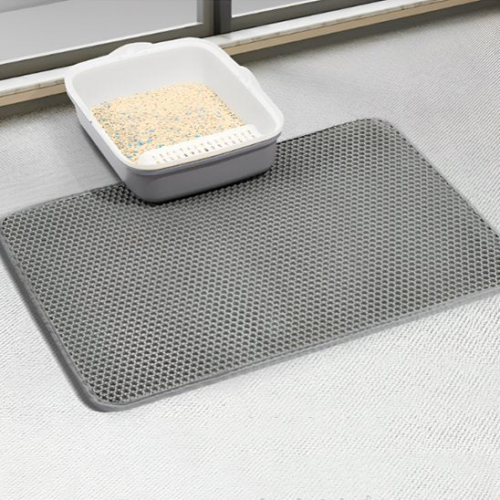Tapis chat litière gris sous bac